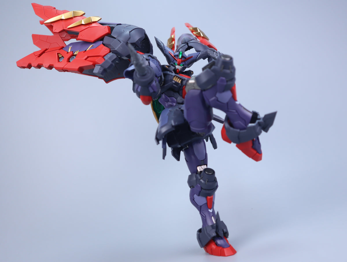 Burning Soul BS01 Grandmaster in grounded martial arts battle stance with wings lowered